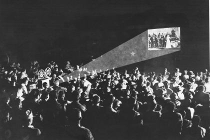 Black and White Old Cinema Audience Looking at Screen